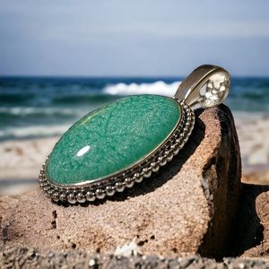 Beautiful statement piece silver and teal necklace pendant.